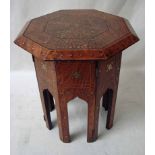 An Anglo Indian octagonal occasional table, brass and copper inlaid, removable top, hinged base,