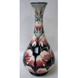 A large modern Moorcroft pottery bottle vase, tubeline decorated in the Desert Ivory pattern by Anji