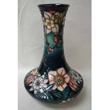 A large modern Moorcroft pottery vase, tubeline decorated in the Carousel pattern by Rachel