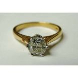 An 18ct gold and diamond solitaire ring, stone 0.8 carat approx in six claw white gold mount, ring
