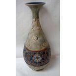 A Royal Doulton Arts and Crafts stoneware vase, narrow neck ovoid form, decorated in relief with