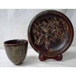 A Royal Copenhagen stoneware dish of circular form, brown, relief decorated internally with an Eagle