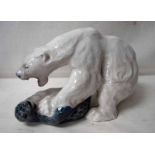 A large Royal Copenhagen sculptural model, Polar Bear and Seal, number 1108, 23cm high