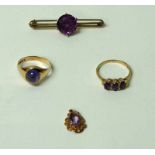 Two 9ct gold and amethyst rings, bar brooch and pendant, 10.8gm gross (4)