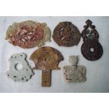 A collection of six Chinese jade/hardstone Bi, each with pierced decoration featuring figures and