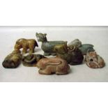 A collection of eight Chinese jade/hardstone Funerary figures including a holy man, hippo, rabbit,