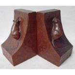 A pair of adzed oak bookends by Robert 'Mouseman' Thompson of Kilburn, of typical form with carved
