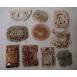 A collection of ten Chinese jade/hardstone pendants in various designs, 4cm to 6cm