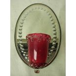 A Victorian glass Girandole wall mirror, the oval bevelled and cut glass wall plate mounted with a