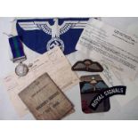 A George VI Palestine Medal 1945-48 2600614 SIGMN. J.E Anderson R.SIGS, one clasp; an Army Book