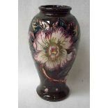 A modern Moorcroft pottery vase, tubeline decorated in the Gustavia Augusta design by Debbie