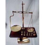 A late 19th century set of brass counter top balance scales by W T Avery, Agate Patent Balance,