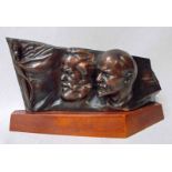 A Russian bronze sculpture depicting the heads of Karl Marx and Vladimir Lenin facing right, 40cm