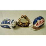 Three Royal Crown Derby bone china paperweights modelled as a fox, 11cm long, a snail, 13cm long and