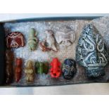 A collection of eleven Chinese Honghsan jade/hardstone carved figures, stylised animals and