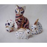 Four Royal Crown Derby bone china paperweights modelled as a cat, 13cm high, a hamster, 6cm high,