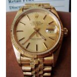 A gentleman's 18k yellow gold Rolex Oyster Perpetual Datejust wrist watch, the signed gilt 30mm dial