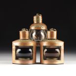 A GROUP OF THREE VICTORIAN BRASS MOUNTED COPPER SHIP SIGNAL LANTERNS, BY H. HUGHES, FEN CHURCH ST,