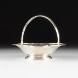 A TIFFANY & CO. STERLING SILVER FRUIT BASKET CENTER BOWL, 20TH CENTURY, the scalloped rim over a