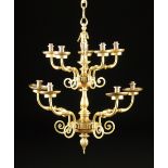 A FLEMISH BAROQUE STYLE EIGHT-LIGHT FIGURAL BRASS CHANDELIER, EARLY 20TH CENTURY, the brass two-