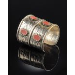 A JEWISH YEMENITE AMBER LADY'S ARM CUFF, 19TH CENTURY, of open conical form, the cuff separated into