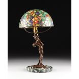A VIENNA SECESSIONIST STYLE PATINATED BRONZE AND SLAG GLASS TABLE LAMP, LATE 19TH/EARLY 20TH