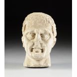 A RARE LIFE-SIZE ROMAN CARVED MARBLE HEAD OF A MAN, 4TH CENTURY, found buried in the village of West