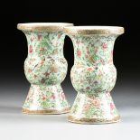 A PAIR OF CHINESE EXPORT POLYCHROME ENAMELED CELADON GROUND PORCELAIN VASES, 20TH CENTURY, each