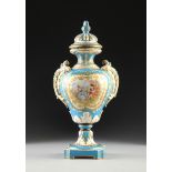 A SÈVRES STYLE PARCEL GILT AND POLYCHROME PAINTED BLEU CELESTE GROUND COVERED VASE, LATE 19TH