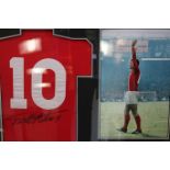 An England shirt signed by 1966 World Cup winner and hat-trick hero Geoff Hurst