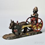 Painted Cast Iron "Bad Accident" Mechanical Bank, a lever activates the figure of a child hiding