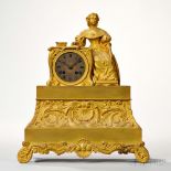 Gilt-brass Figural Mantel Clock, France, c. 1840, with a seated figure of a woman resting against