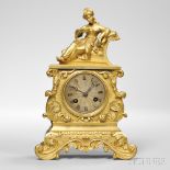 Diminutive Gilt-brass Figural Mantel Clock, France, c. 1850, the Grecian-style female figure resting