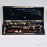 French Flute, Tulou, 19th Century, with gold keys, the five sections each branded TULOU PARIS