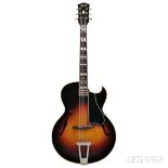 Gibson L4-C Archtop Guitar, c. 1960, serial no. A34351, with original case and hang tag. Gibson L4-C