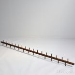 Drying Rack, pine, dark brown patina, 3-in. long dowels extend on either side of a square shaft in