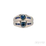 Platinum and Sapphire Ring, c. 1940, with two cabochon sapphires with French-cut synthetic