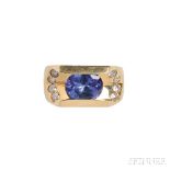 14kt Gold, Tanzanite, and Diamond Ring, set with an oval tanzanite measuring approx. 10.00 x 8.00