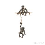 Whimsical Monkey Brooch, depicting two silver monkeys set with pastes, one resting upon a gold