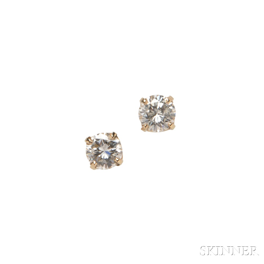 14kt Gold and Diamond Earstuds, each prong-set with a full-cut diamond weighing approx. 0.50 cts.