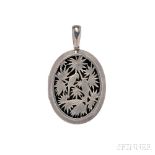 Victorian Sterling Silver Locket, in the Japanesque style with pierced bird and bamboo motifs,