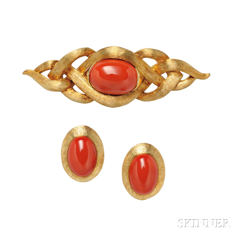 18kt Gold and Coral Suite, Henry Dunay, the brooch designed as a textured knot centering an oval