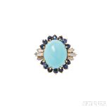 18kt Gold and Turquoise Ring, set with an oval cabochon turquoise measuring 14.50 x 11.70 mm, framed