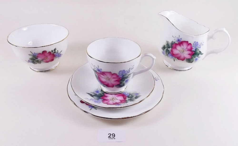 A Duchess floral 1950's tea service : six cups and saucers, six tea plates, one cake plate, milk and