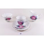 A Duchess floral 1950's tea service : six cups and saucers, six tea plates, one cake plate, milk and