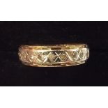 A 9 carat gold eternity ring set chip diamonds