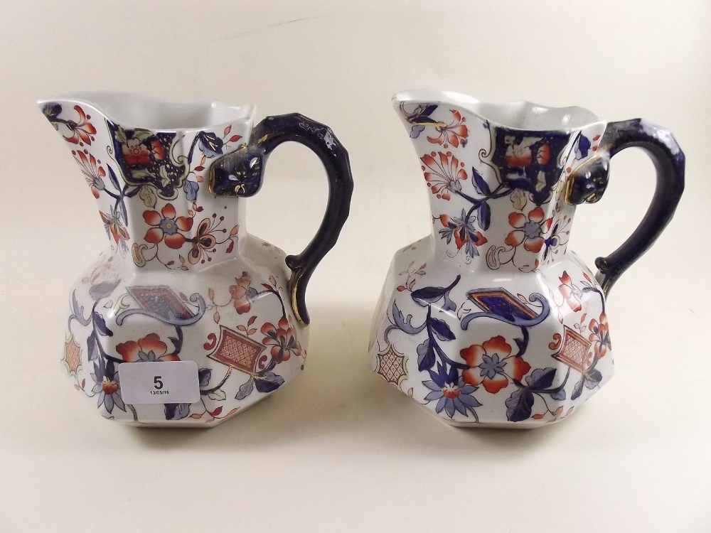 A pair of Victorian ironstone Imari style jugs