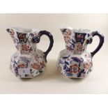 A pair of Victorian ironstone Imari style jugs