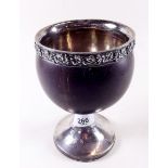 A silver mounted coconut cup with embossed vines to rim - London 1814, maker JL (nut a/f)