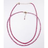 A ruby bead necklace and a similar tourmaline bead necklace